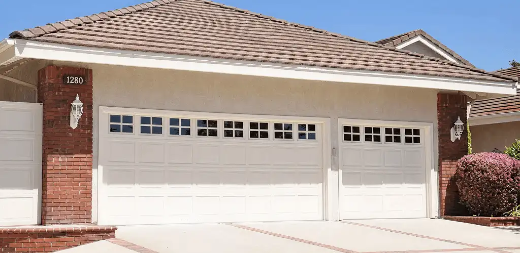 Residential garage door repair service for a double garage door in Evansville, IN