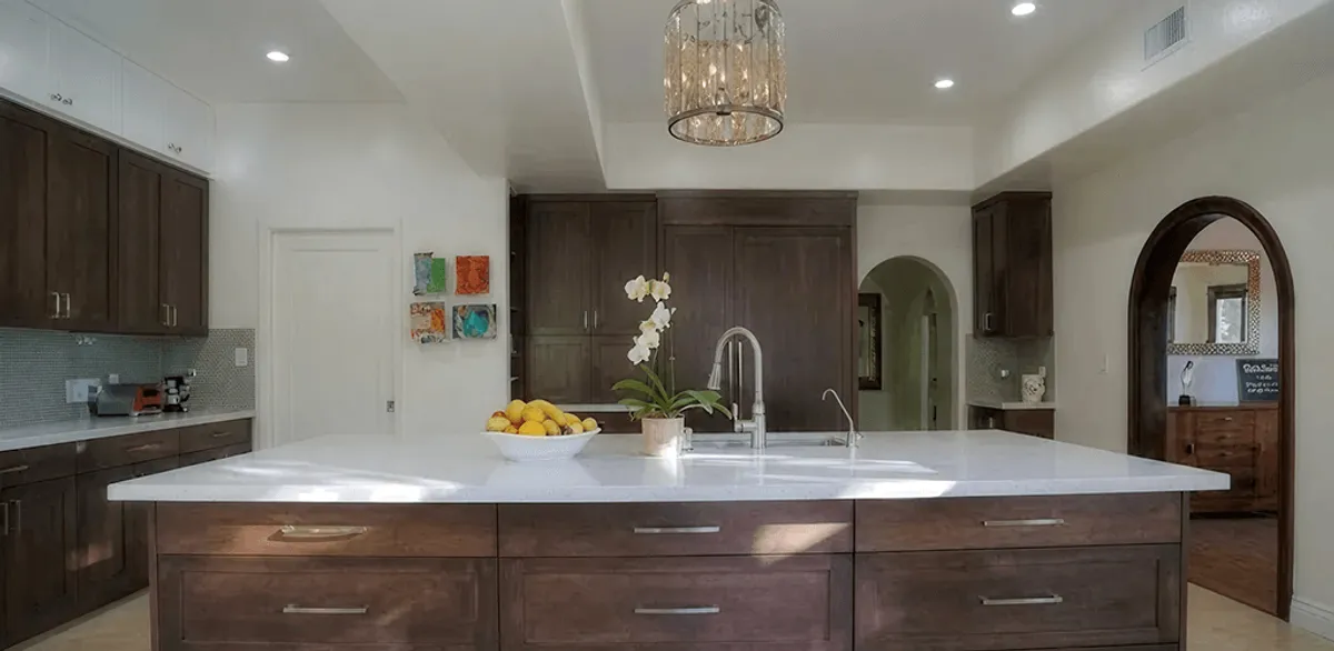 Cabinet refacing project with updated kitchen cabinets and island in Evansville, IN
