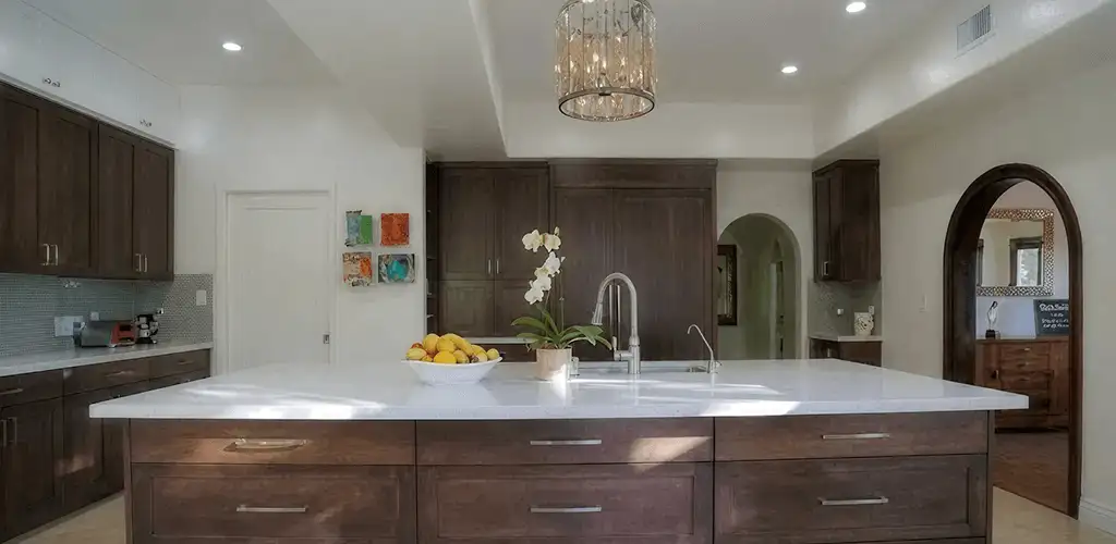 Cabinet refacing project with updated kitchen cabinets and island in Evansville, IN
